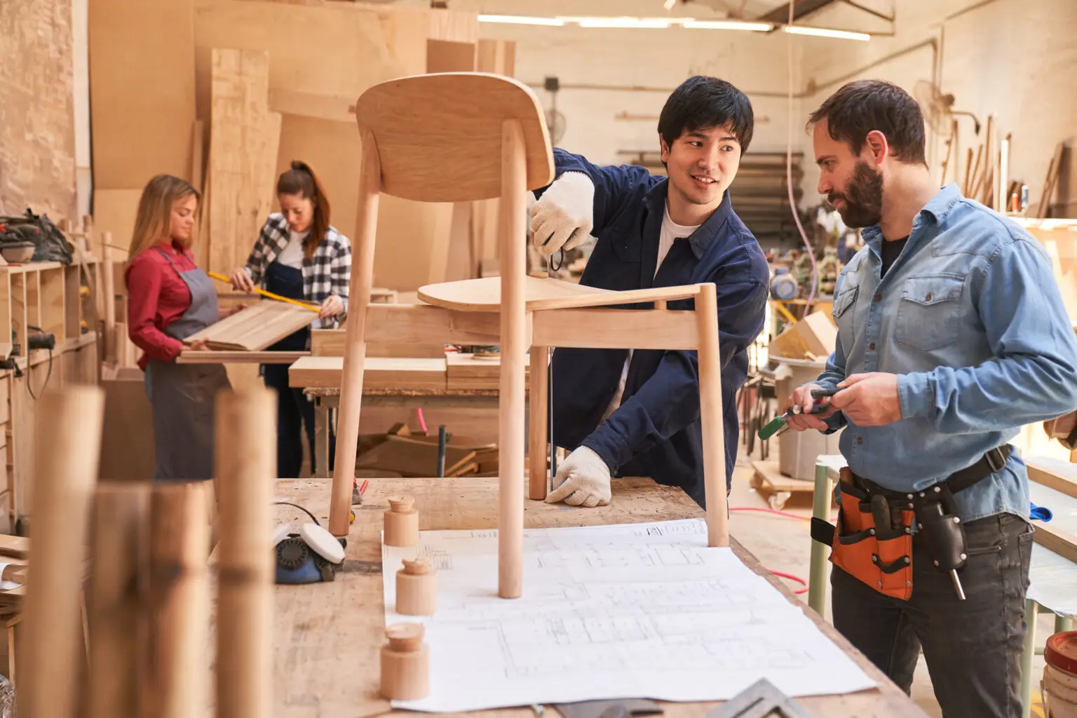 Cabinet,Makers,Build,A,Wooden,Chair,Together,In,The,Cabinet