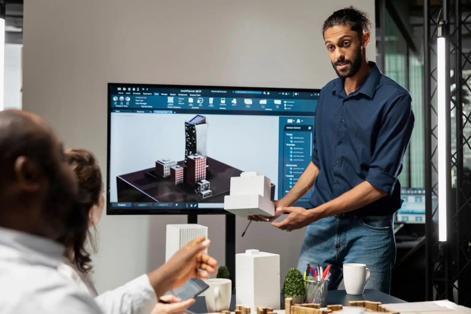 Male,Real,Estate,Engineer,Presenting,Smart,City,Design,And,Buildings